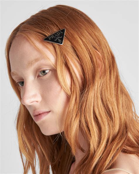 prada metal hair clip.